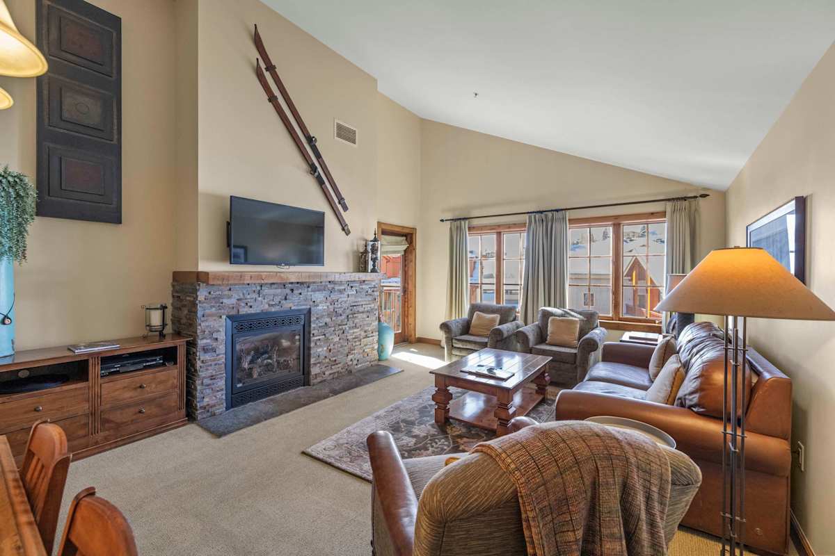 Spacious Vaulted living room with Gas Fireplace | Listed with @BookTraverse