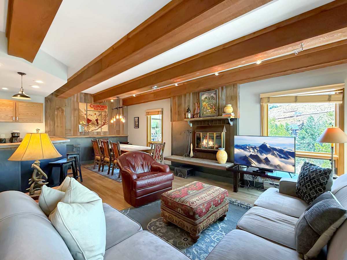 Wood Burning Fireplace and room for everyone to relax | Listed with @BookTraverse