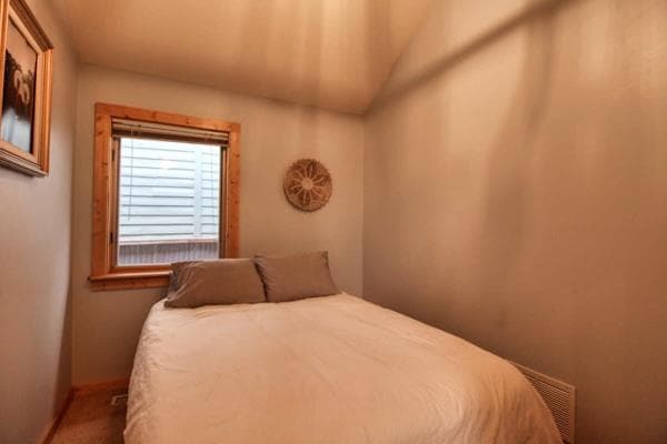 【Queen Bedroom】 Second bedroom with a queen — sleeps the second couple or the kids.