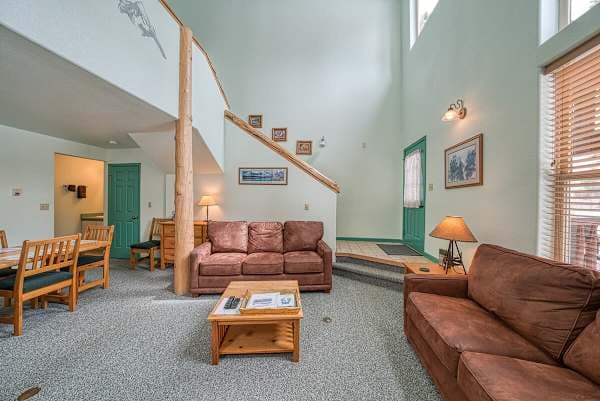 【Living Room — Sofa Bed】Sectional doubles as a sleeper for the 8th guest — pull out for a kid or last-minute friend.