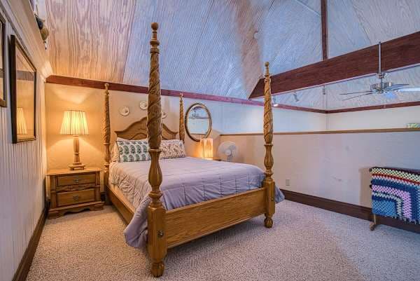 【Loft Bedroom】 Queen bed up the spiral staircase — the favorite room for couples.