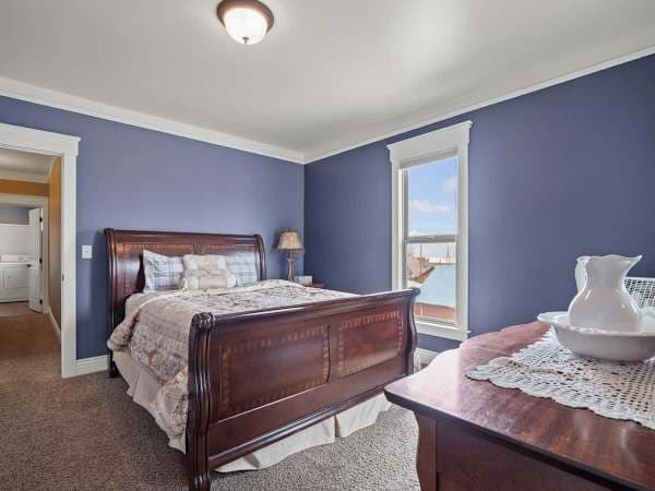 【Bedroom】 One of three bedrooms — King in the primary, queens in the other two.