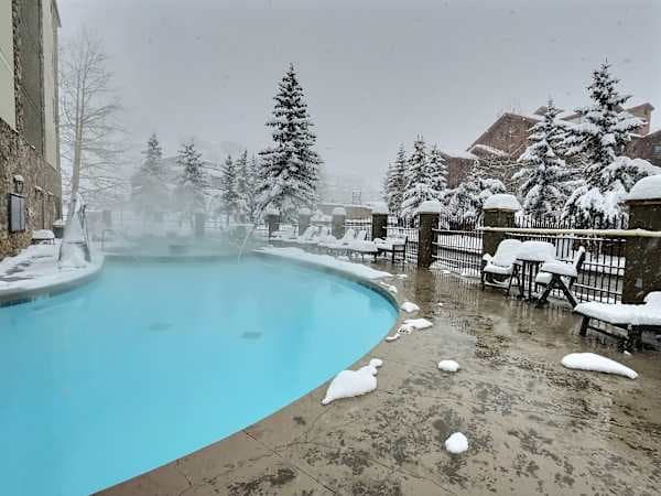 Snowy, Steamy, Relaxing Winters w/ the Heated Pool & Hot Tub | Listed with @BookTraverse