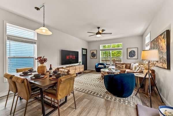 【Main Living】Open layout sleeps 8 around the kitchen — no one stuck eating in the kitchen alone