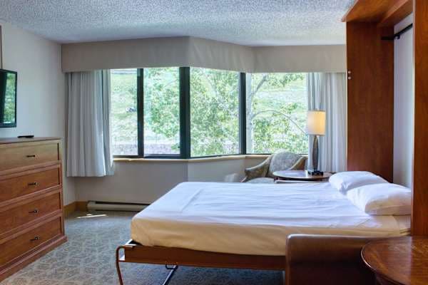 Living Room Murphy Bed | Listed with @BookTraverse