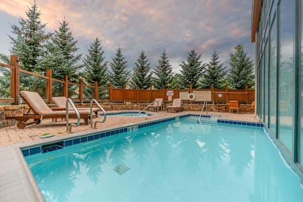 Heated indoor/outdoor pool open all year | Listed with @BookTraverse