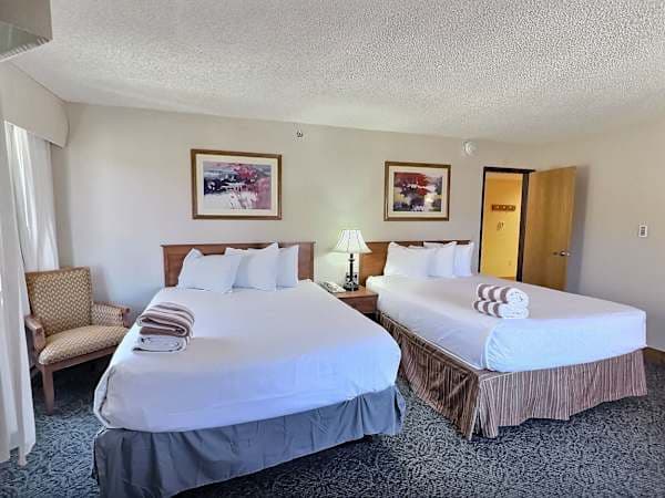 True 1 Bedroom with 2 Queen Beds Brand New Mattresses! | Listed with @BookTraverse