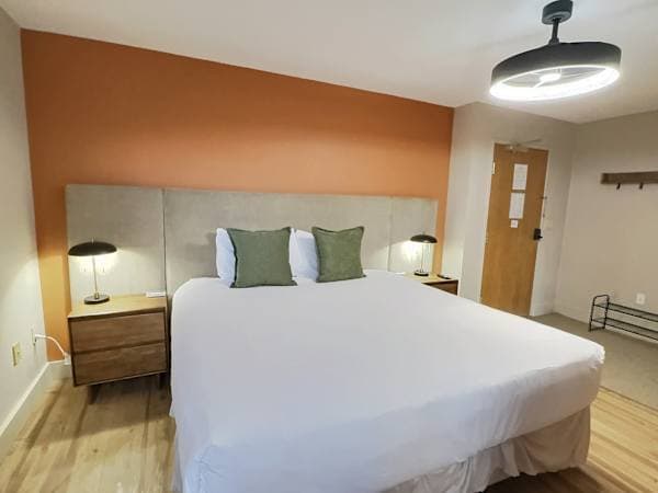 Comfortable king bed in separate sleeping area | Listed with @BookTraverse