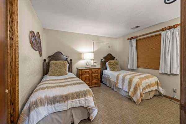 【Bedroom 2 — Twin Room】Two Twins + en-suite bath — kids or two friends, nobody shares | Listed with @BookTraverse