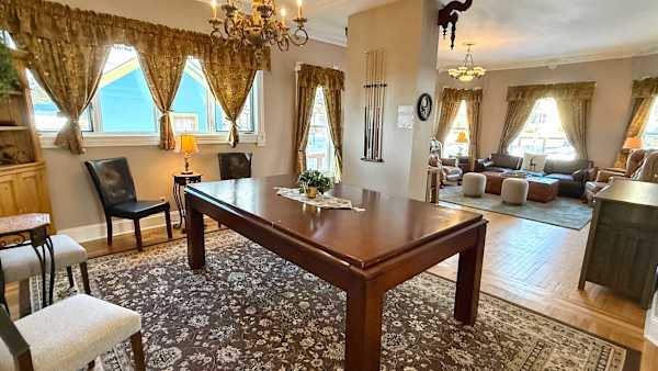 Game Room: Full-size pool table -- the centerpiece of every group night