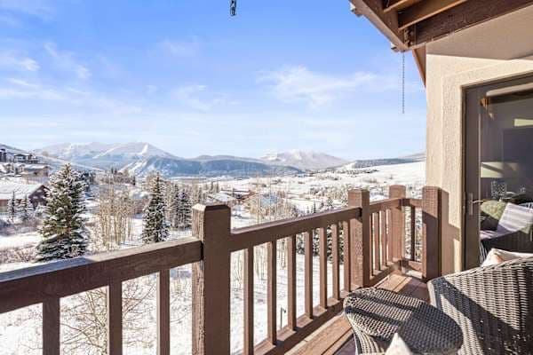 【Private Balcony】Primary-bedroom balcony — direct line of sight to Mt. Crested Butte, coffee in hand