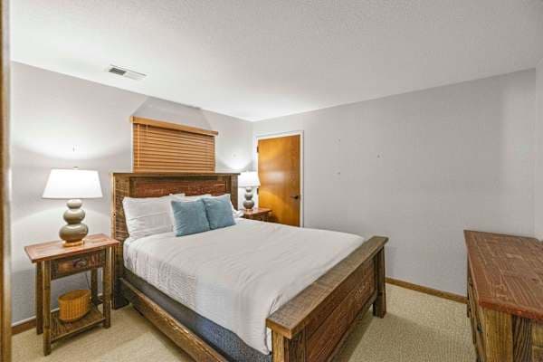【Bedroom 2】 Queen bed — second full bath is steps away, bright windows in the morning.