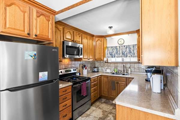 【Kitchen】 Full-size range, dishwasher, coffee maker — stocked for a week of home-cooked meals.