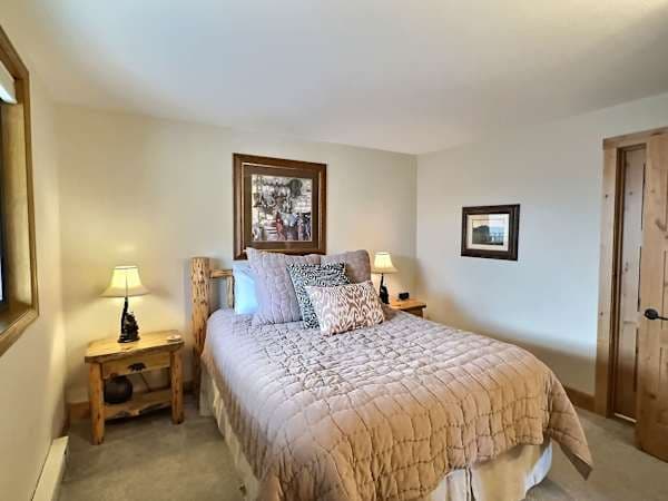 【Bedroom 2 — Queen】Queen bed, hall full bath — sized for kids or a second couple