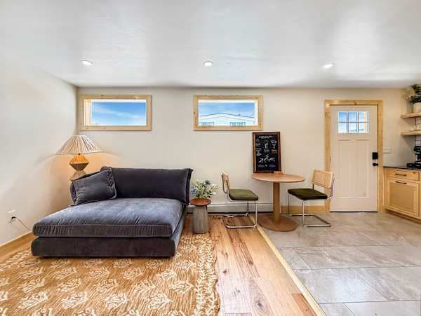 【Great Room】 Open kitchen-dining-lounge — your everyday hub one block off Main Street