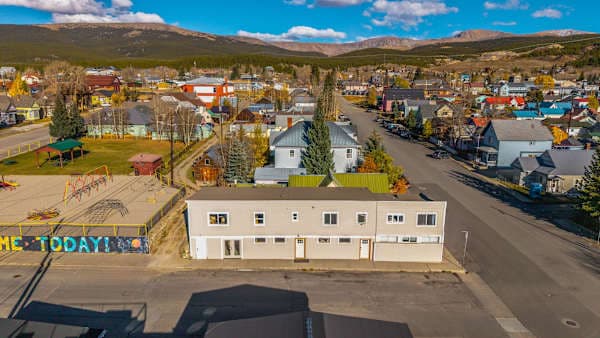 【Aerial】 Your building, the park next door, and the Sawatch Range — all on the same block