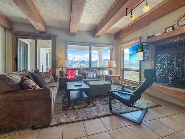 Wood Burning Fireplace with a mountain view | Listed with @BookTraverse