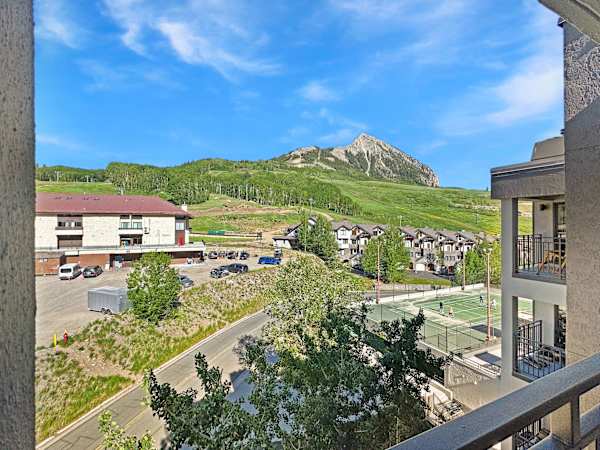View from the Balcony Side to check conditions on the mountain | Listed with @BookTraverse