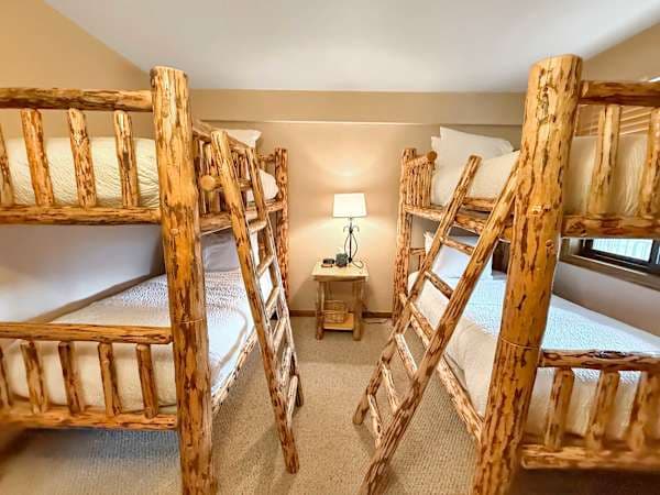 Bunk room with 4 twins | Listed with @BookTraverse
