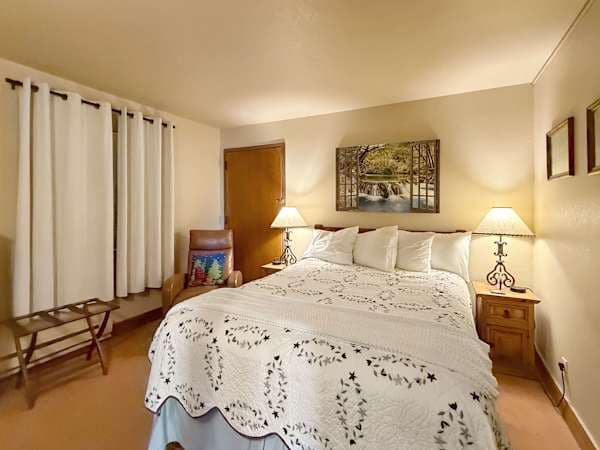 Queen Bedroom with connected bath | Listed with @BookTraverse