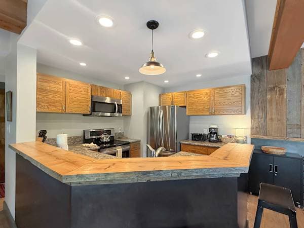 Updated Kitchen with bar top | Listed with @BookTraverse