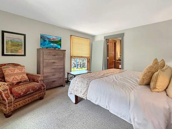 Primary Bedroom with King and Ensuite Bath | Listed with @BookTraverse