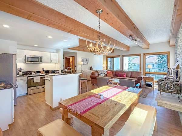 Open Concept, Wood burning Fireplace and room to relax! | Listed with @BookTraverse