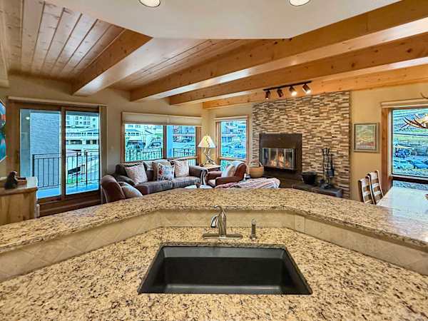 Open Kitchen wth Bar seating| Listed with @BookTraverse