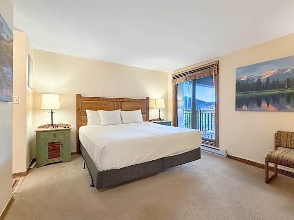 King Bedroom with ensuite bath and baclony access | Listed with @BookTraverse