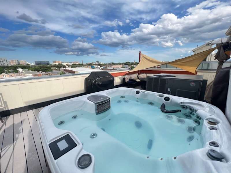 Stylish modern room with rooftop hot tub